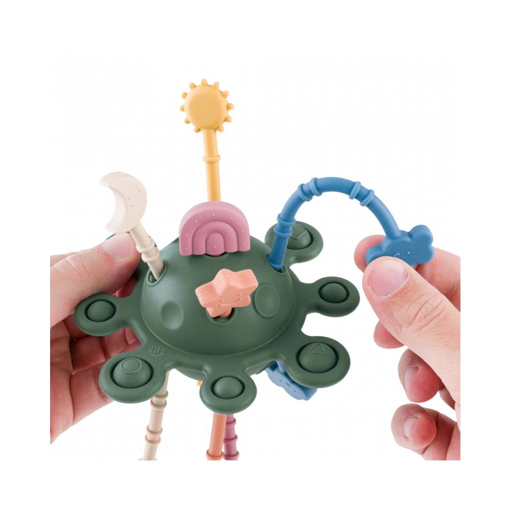 PETITE&MARS Silikonska senzorna igračka Crazy planet 10 m+, Misty Green