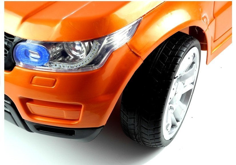Auto na akumulator HL1638 EVA - narančasti