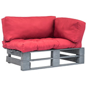 Vrtna sofa od paleta od borovine s crvenim jastucima