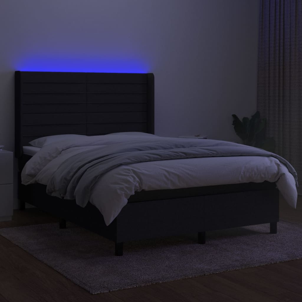 Krevet box spring s madracem LED crni 140x190 cm od tkanine