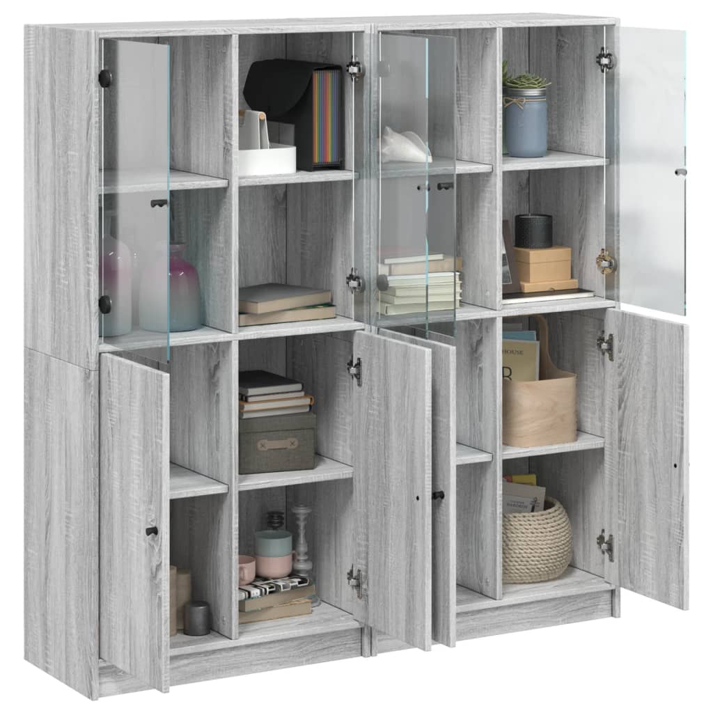 Regal za knjige s vratima boja hrasta 136x37x142 cm drveni