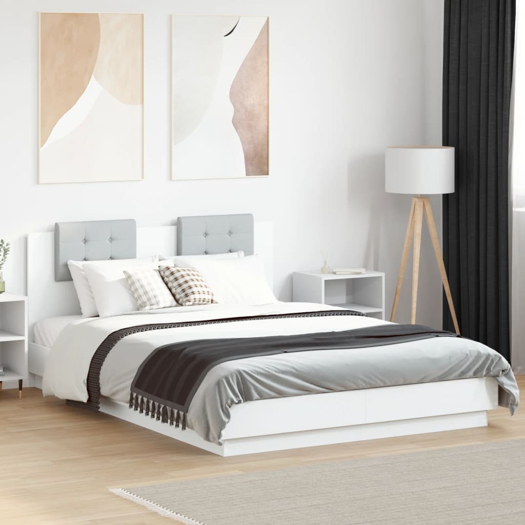 Okvir kreveta s uzglavljem i LED svjetlima bijeli 140 x 200 cm