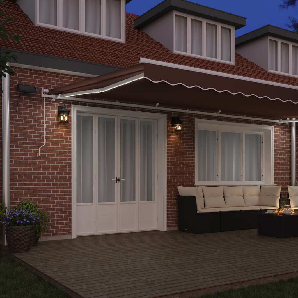 Tenda na ručno uvlačenje s LED smeđa 600 x 300 cm