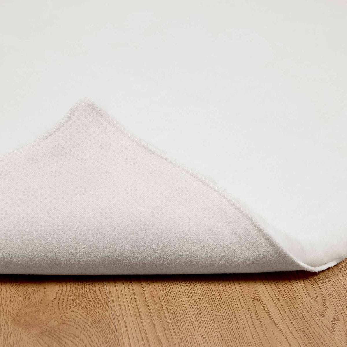 Protuklizni tepih od umjetnog zečjeg krzna OLITE Bijela 80 x 150 cm